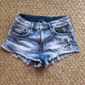 Divided by H&M denim light wash cut offs. Size 6